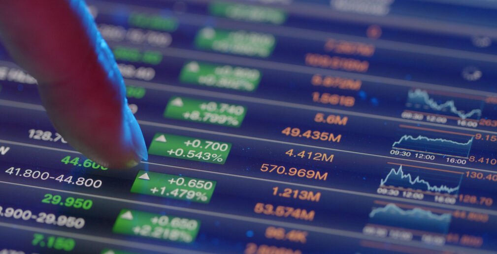 Stock market analysis on digital tablet Stock market analysis on digital tablet