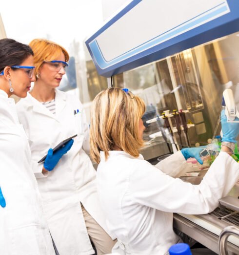 Photo of real female scientists researching in laboratory. Photo of real female scientists researching in laboratory.